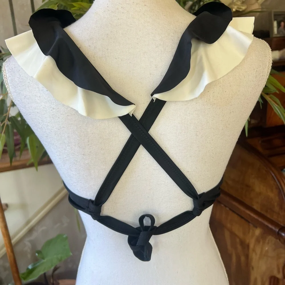 Ladies size Medium NWOT swim suit top black and white. Adorable